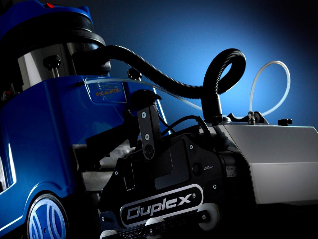 Image demonstrating the cleaning of escalators and travelators with Duplex machines.