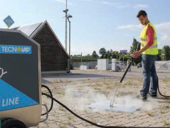 Eco-friendly steam weed control system being used in an urban landscape, highlighting its efficiency and environmental safety.