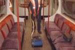 Image depicting advanced cleaning equipment efficiently tackling stains on couches and transport vehicle floors, emphasising ease of use.