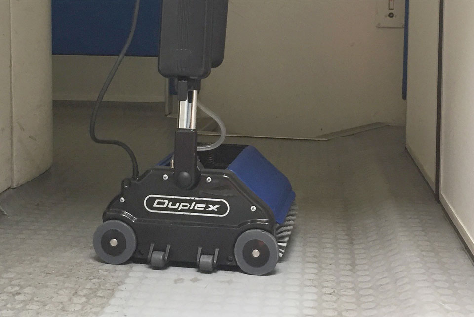 Duplex Lithium machine cleaning a textured safety floor