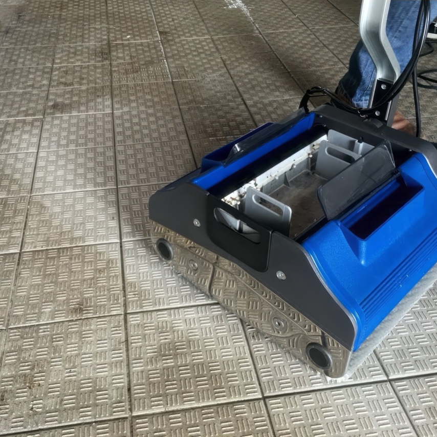 Duplex 420 commercial floor scrubber deep cleaning textured tile surface and grout